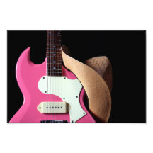 Guitarra y gorra de la vaquera fotografias