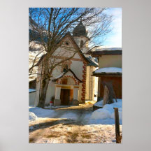 Iglesia en el centro de un pueblo suizo poster