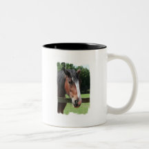 Imagen de una taza de café cuarta del caballo