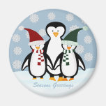 Imán de la familia del pingüino del día de fiesta