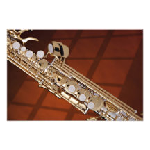 Impresión del saxofón del soprano contra el oro impresiones fotográficas