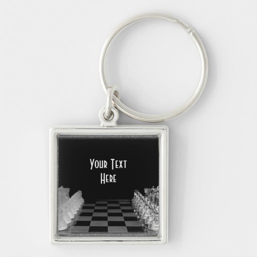 Juego de mesa de cristal negro y blanco del ajedre llaveros