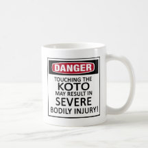 Koto del peligro taza de café