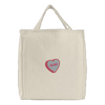 La bolsa de asas adorable del corazón de la tarjet