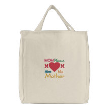 La bolsa de asas bordada preciosa para la mamá
