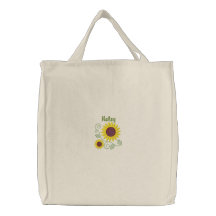 La bolsa de asas con monograma del girasol