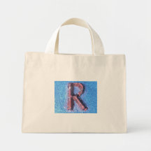 La bolsa de asas de la isla "R" de la fuente