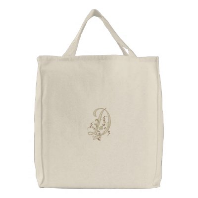 La bolsa de asas de la letra D del monograma de la La bolsa de asas de la letra D del monograma de la
