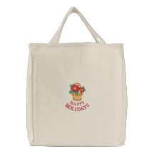 La bolsa de asas del día de fiesta con los Poinset