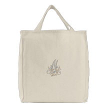 La bolsa de asas del monograma M de las flores