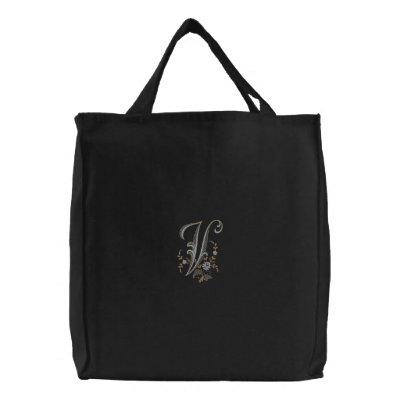 La bolsa de asas del monograma V de las flores