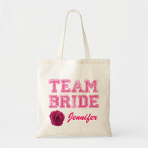 La bolsa de asas rosada de la novia del equipo