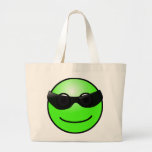 La bolsa de asas verde de la cara