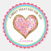 La galleta del corazón con asperja a los pegatinas