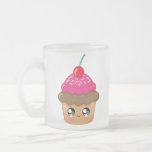 La magdalena con la cereza y asperja tazas de café