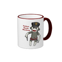 La policía pega el mono tazas de café