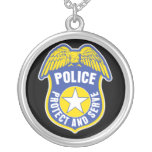 La policía protege y sirve la insignia grimpolas