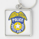 La policía protege y sirve la insignia llaveros