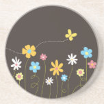 La primavera enrrollada florece el práctico de cos posavasos