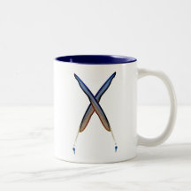 La taza del artista cruzado de las canillas