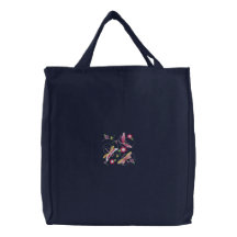 Las libélulas y las flores bordaron la bolsa de as