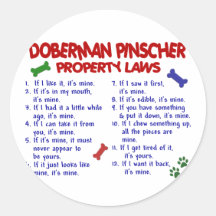 Leyes 2 de la propiedad del PINSCHER del DOBERMAN Pegatina