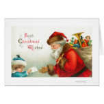 Little Boy que da a Santa una letra Felicitaciones