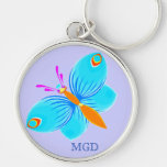 Llavero azul del premio de la mariposa y del monog