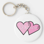 Llavero rosado de los corazones de la danza