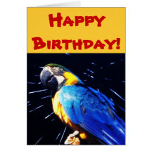 Loro azul con la tarjeta del feliz cumpleaños Gree