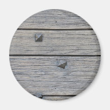 Los tablones de madera con los clavos cuadrados te imán de frigorifico