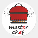 Maestro cocinero con el pote y la tapa calientes e pegatinas  
