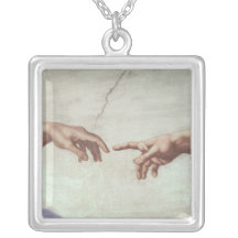 Manos de dios y de Adán Joyerias