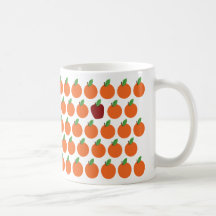 Manzanas y naranjas taza