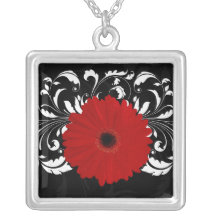 Margarita roja brillante del Gerbera en negro Joyeria