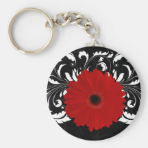 Margarita roja brillante del Gerbera en negro Llaveros