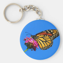Mariposa en la comida fría llaveros