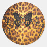 MARIPOSAS ANARANJADAS EN ESTAMPADO LEOPARDO ETIQUETA REDONDA