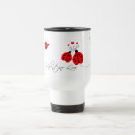 Mariquitas en taza del viaje de la tarjeta del día