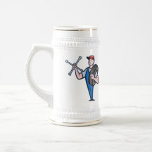 Mecánico con la llave y el neumático de zócalo del taza de café