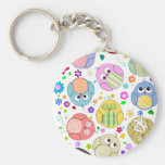 Modelo lindo de los búhos y de flores llaveros personalizados