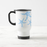 Modelo manchado de las estrellas de mar en azul y  taza de café