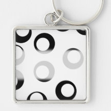 Modelo retro blanco y negro de los círculos llaveros