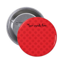 Modelo rojo del copo de nieve en rojo pin