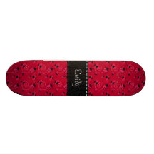 Modelo rosado y negro de la mariquita tabla de patinar