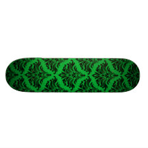 Monopatín retro del verde del negro del vintage