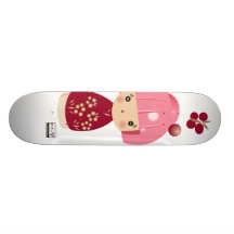 Monopatín rosado del trío de Kokeshi