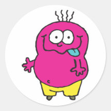 monstruo tonto que pega hacia fuera la lengua etiqueta redonda