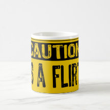 Muestra de la precaución - es un amarillo/un negro tazas