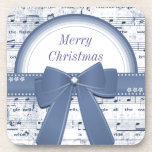 Música azul de las Felices Navidad con el práctico posavasos de corcho